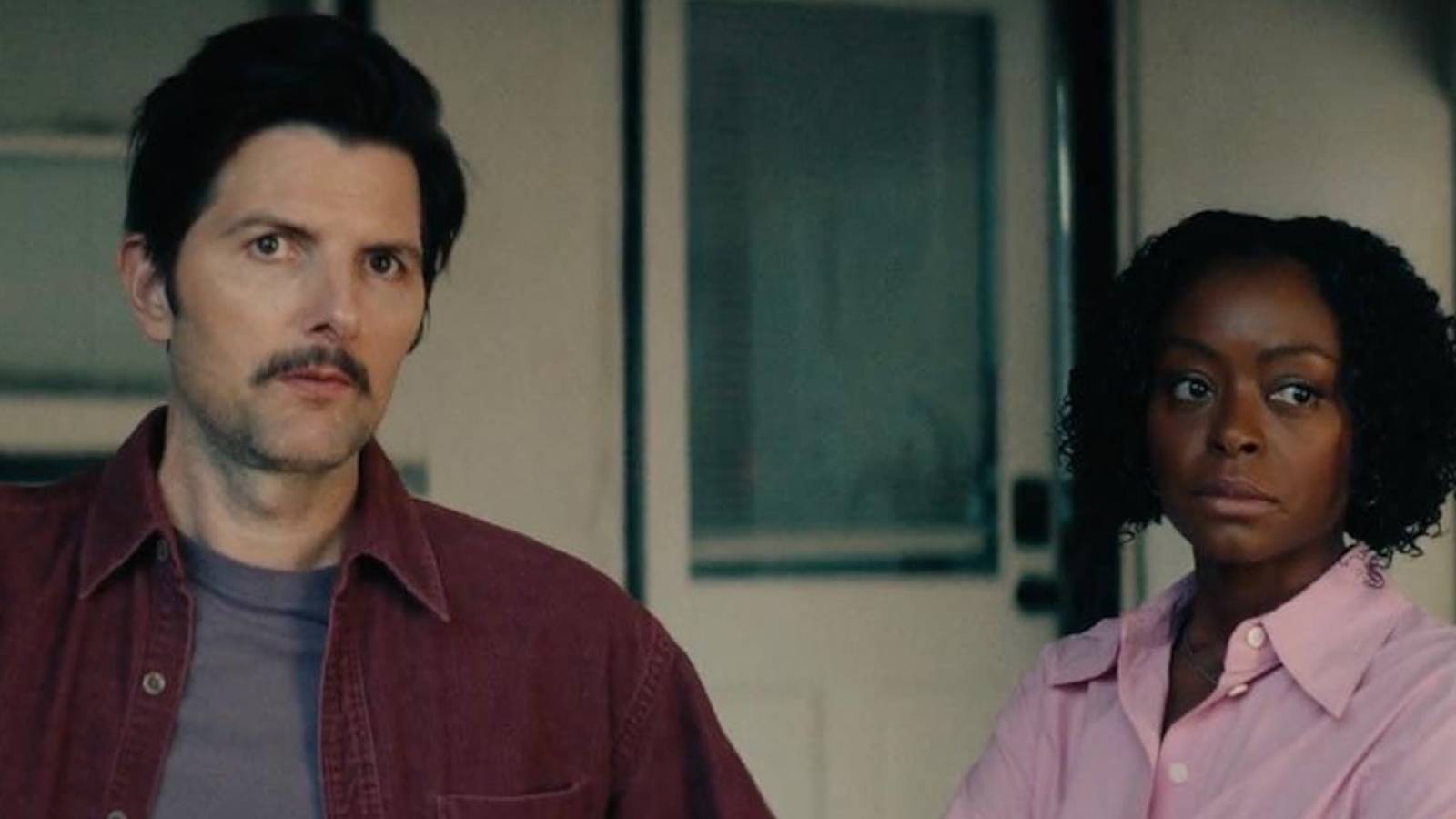 Adam Scott & Danielle Deadwyler's 'The Saviors' Struggles to Land Its Satirical Punch