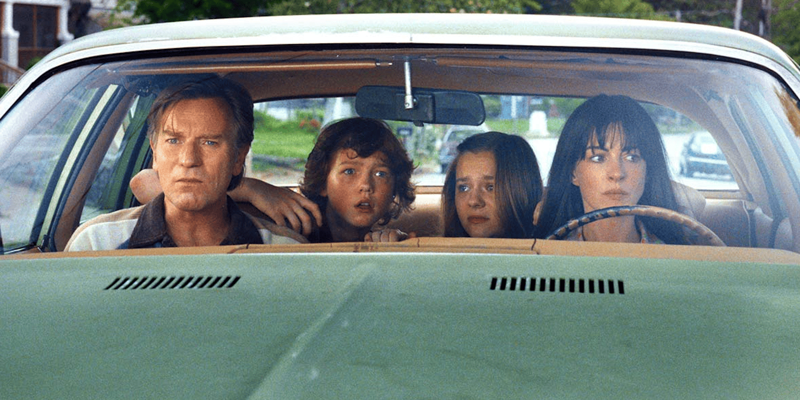Anne Hathaway's Suburban Dream Becomes a Dino-Mite Nightmare in 'The End of Oak Street' Trailer