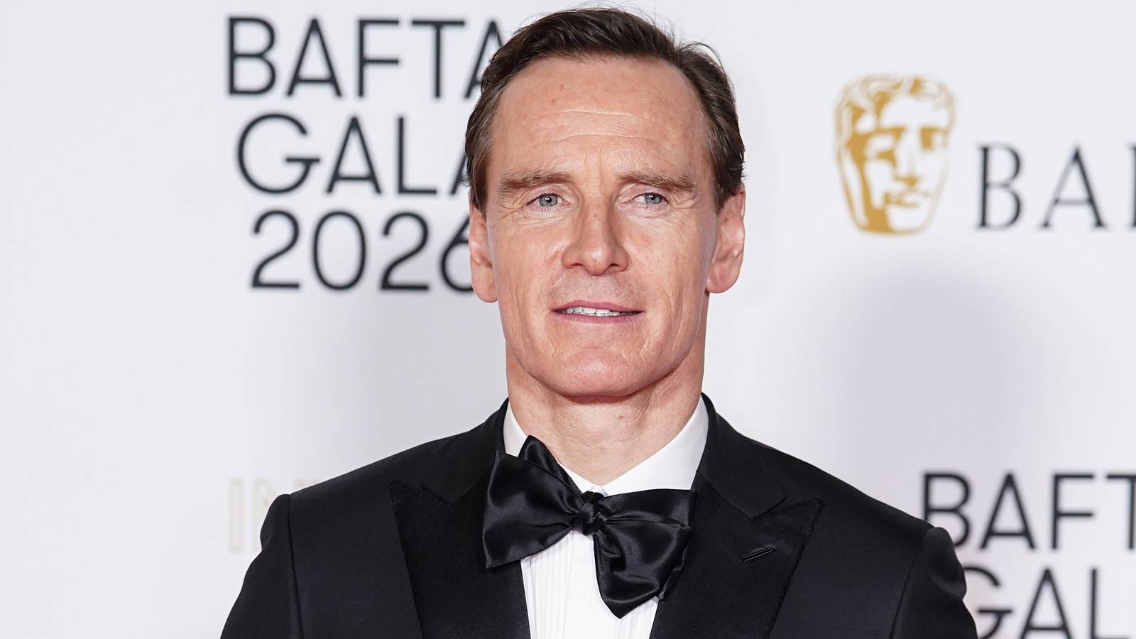 First Look: Michael Fassbender Transforms Into JFK in Netflix's Epic Political Thriller